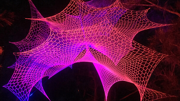 3D world of crocheted vortex nets in white acrylic wool
